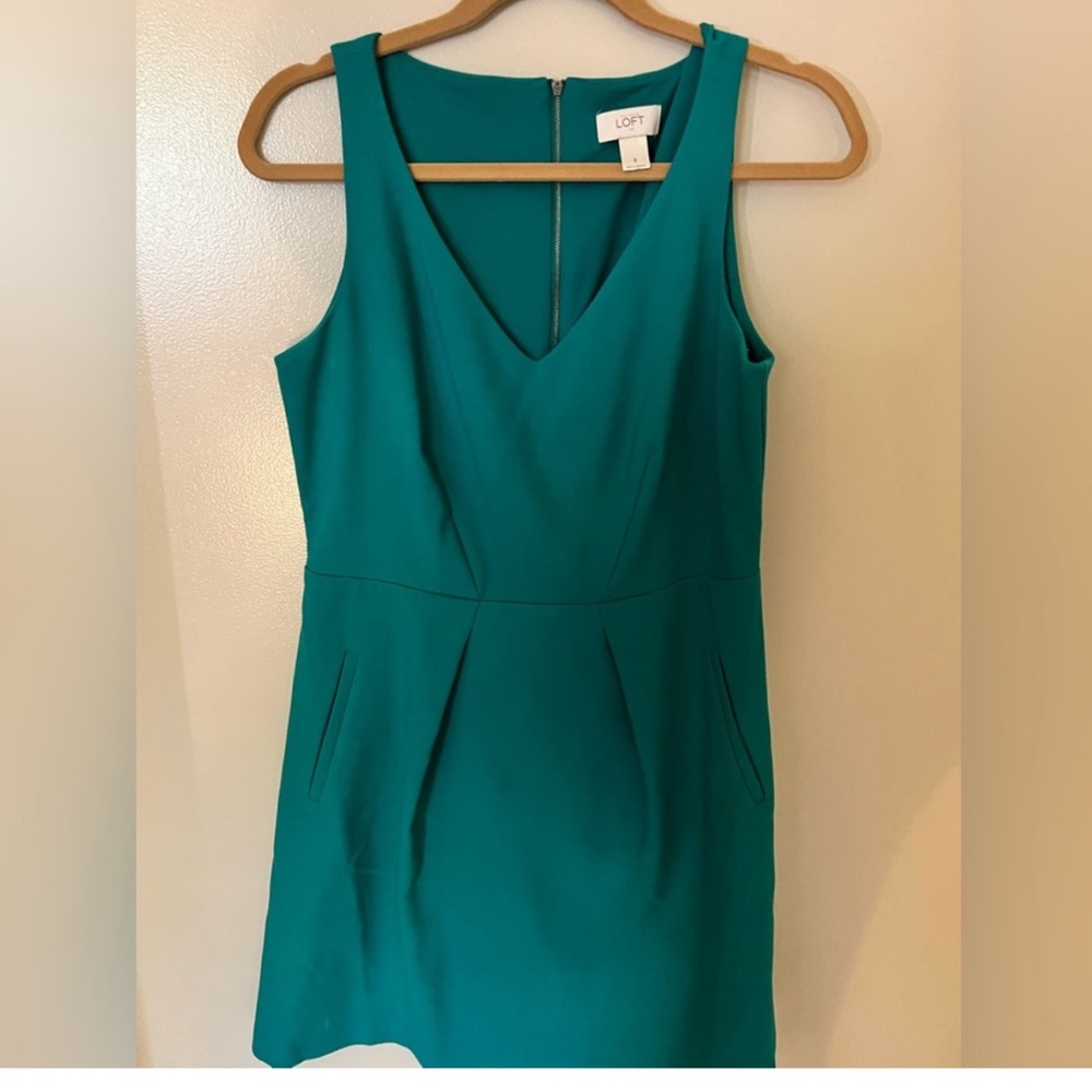 LOFT Teal V neck with pockets Sz 8